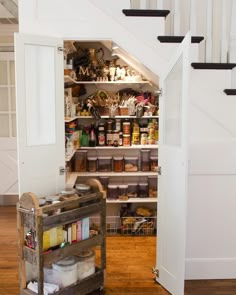 an open pantry with lots of food in it