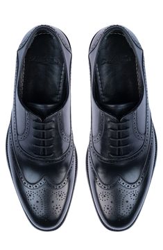 Handmade of smooth leather, this wingtip toe dress shoe with a classic oxford silhouette offers a sophisticated, elegant look. Leather upper and lining/synthetic sole Made in Turkey Classic Slippers, Wingtip Shoes, Private Investigator, Wingtip Oxford, Flip Flop Slippers, Ugg Classic, Dress Shoe, Denim Branding, Sweaters And Leggings