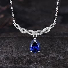 Item description ✦ Handmade, high-quality item! ✦ Material: 925 sterling silver, Solid 14K/18K GOLD (can be made in white/rose/yellow gold), Platinum ✦ Center Stone: 7x9mm Pear Cut Lab Blue Sapphire ✦ Side Stones: Round Cut Moissanites ✦ Chain length can be adjusted between 16 inches and 18 inches As it is handmade, it needs 2-4 weeks to finish and then be shipped by USPS or FedEx. Return policy: We offer 30 days return policy. For any reason, if you are not completely satisfied with your order, you may return it for a refund.  Buyer is responsible for the handcraft fee (15%-30% of the total price) and the return shipping cost. Diamond Cut Lab-created Sapphire Necklace As Gift, Sapphire Necklace With Prong Setting For Anniversary, Anniversary Sapphire Necklace With Prong Setting, Sapphire Pear-shaped Necklace For Anniversary, Sapphire Necklaces For Anniversary, Gift Necklace With Lab-created Sapphire And Diamond Cut, Anniversary Sapphire Necklace, Anniversary Lab-created Sapphire Diamond Cut Necklaces, Sapphire Necklace With Prong Setting In Sterling Silver