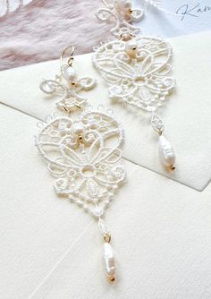 Delicate White Lace Bride Earrings Dangle Lightweight Bridal - Etsy Poland White Intricate Drop Earrings, White Dangle Bridal Earrings With Intricate Design, White Bridal Dangle Earrings With Intricate Design, Delicate Lace Wedding Jewelry, White Bridal Earrings With Intricate Dangle Design, White Intricate Design Dangle Earrings, Handmade Delicate Pearl White Bridal Earrings, Delicate Handmade Pearl White Bridal Earrings, Elegant Pearl Bridal Earrings With Intricate Design