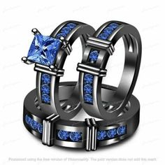 two wedding rings with blue sapphire stones on each ring and the words,'i love you