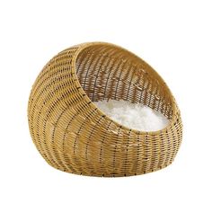 a round wicker bowl with white rice in it