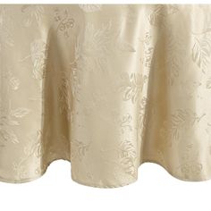 an image of a table cloth with floral designs on the top and bottom half of it