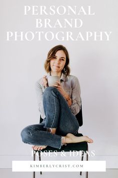 a woman sitting on top of a chair holding a cup