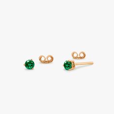 Made to Order. 
Gold KT: 14K
Custom Gold Color: Rose Gold, Yellow Gold, White Rhodium
Gemstone Cut: Round
Gemstone: Emerald
Number of Stones: 2
Stone Size: 3.0MM
Total CTW: 0.41ctw
Setting Type: 3 Prong

You'll look effortlessly elegant in our round cut emerald earrings. Simple yet striking, these gorgeous stud earrings will add a touch of drama to your everyday wear. The round cut and deep emerald color will suit a multitude of styles making them easy to pair with almost anything. A versatile a Emerald Stud Earrings, Emerald Earrings Studs, Aesthetic Jewelry, Jewelry Safe, Emerald Color, Earrings Simple, Emerald Earrings, Buying Jewelry, Gold Yellow