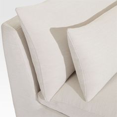 two pillows are folded on top of each other