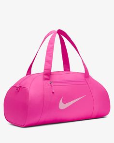 Whatever your fitness goal is, let this duffel bag be your companion. Simple and sleek, the Nike Gym Club Duffel has the space to hold all the essentials without the bulkiness of a regular duffel. Pink Gym Bag, Nike Rosa, Nike Bag, Bag Nike, Womens Gym Bag, Gym Club, Pink Gym, Nike Bags, How To Store Shoes