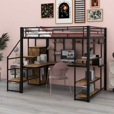 a loft bed with desk underneath it in a pink walled room next to a potted plant