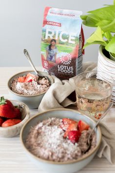 three bowls of oatmeal with strawberries on the side next to a bag of rice