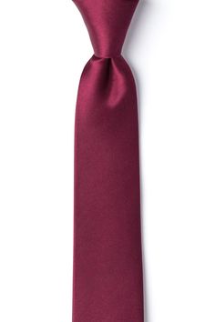 Dress your son in elegance with this premier solid-color boy's necktie.  Rendered in a rich maroon weave atop a choice selection of hand-sewn silks, this handsome necktie best befits the finer events of a young man's life.  Cut with a slim two inch cut and featuring a sleek satin sheen, this tie keeps stylish without losing the charm of the classics -- an excellent necktie for weddings, baptisms, funerals, galas, and other formal events and the dignified choice for any young and refined gentleme Maroon Tie, Maroon Wedding, Beige Suits, Boys Ties, Tie For Men, Maroon Color, Silk Ties