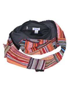 Tote your essentials in boho style with this bold cotton handbag that will add a splash of flash to multiple ensembles. Note: This one-of-a-kind item is handcrafted. Actual colors may be different than shown. Approximate Bag Size: 14" x 3.5" x 13"; Shoulder Strap Length: 22" Lined Interior with side pocket, Top zipper with button fastener 100% Cotton Hand Wash, Hang Dry Made in Nepal Bohemian Cotton Shoulder Bag For Travel, Hippie Cotton Shoulder Bag For Travel, Everyday Bohemian Cotton Hobo Bag, Bohemian Cotton Hobo Shoulder Bag, Festival Cotton Tote Shoulder Bag, Bohemian Cotton Hobo Bag For Festival, Bohemian Multicolor Cotton Canvas Bag, Casual Cotton Hobo Bag For Festival, Bohemian Cotton Canvas Shoulder Bag