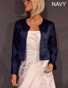 Hip length satin bolero jacket with long sleeves and scoop neck. Made from high quality bridal satin. Very flattering and comfortable fit. Great for the mother of the bride or anyone looking for a little extra coverage. VIEW PICTURES FOR SIZE AND MEASUREMENT CHART If you are needing more then four of this item just let us know. We are happy to offer VOLUME DISCOUNTS We keep several in each size in stock so that we can ship all orders out ASAP! If you need more then the quantity listed just conta Elegant 3/4 Sleeve Evening Outerwear, Elegant Evening Outerwear With 3/4 Sleeves, Elegant Satin Outerwear For Wedding, Elegant Satin Wedding Outerwear, Elegant Wedding Satin Outerwear, Fitted Long Sleeve Satin Outerwear, Elegant Fitted Solid Shrug, Fitted 3/4 Sleeve Party Shrug, Elegant 3/4 Sleeve Shrug For Spring