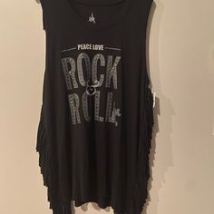 Disney Peace Rock And Roll Graphic T-Shirt With Fringes. 30” Long. Sleeveless. New With Tag. Casual Sleeveless T-shirt For Concerts, Summer Concert Sleeveless T-shirt, Sleeveless T-shirt For Summer Concerts, Trendy Sleeveless Top For Music Festival, Casual Sleeveless Tank Top For Music Festival, Graphic Print Tank Top For Music Festival, Trendy Sleeveless Top For Concert, Rocker Sleeveless Vest For Concerts, Black Tank Top For Concert