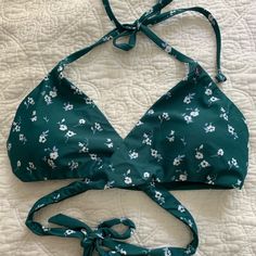 Hollister Bikini Top! Size L. Never Worn - Still Has Tags On. Beachy Triangle Top Tankini, Beachy Green Swimwear Bra Friendly, Summer Triangle Top Tankini, Bra Friendly, Spring Triangle Top Swimwear For Sunbathing, Floral Print Fitted Halter Top For Pool, Fitted Floral Print Halter Top For Pool, Fitted Floral Print Halter Top For Beach Party, Floral Print Halter Top For Poolside And Beach Season, Floral Print Triangle Halter Top For Beach Season