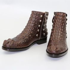 These handmade boots are the best-in-class footwear. Featuring a British-style alligator design in an attractive shade, these durable genuine leather boots are a head-turner. They come with exceptional quality zipper closure to make it look fabulous. The pointed-toe, solid pattern boots have a proper finishing. The footwear is striking yet sophisticated. Specifications is_handmade: Yes Upper Material: Genuine Leather Toe Shape: Pointed Toe Style: British Style Shaft Material: Genuine Leather Sea Pattern Boots, Crocodile Boots, Handmade Boots, Boots Patterns, Handmade Boot, Winter Pattern, Ankle Shoes, Genuine Leather Boots, Crocodile Skin