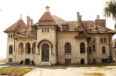 an old building with many windows and towers