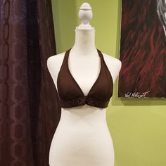 Nwot Dark Brown Tie Back Halter Neck Bikini Top Size: Small. Mannequin Size: 2-4 Designer: Xhilaration Has Detail At The Bottom Of The Top Color: Brown And Silver Has Padding Materials: (Shell) 82% Nylon And 18% Spandex. Lining: 100% Polyester. Care Instructions: Hand Wash. Beachwear Triangle Halter Top For Night Out, Beachwear Halter Top For Night Out Beach Season, Beachwear Halter Top For Night Out, Beachwear Triangle Halter Top For Party, Beach Season Triangle Halter Top For Night Out, Triangle Halter Top For Night Out During Beach Season, Triangle Halter Top For Night Out At Beach Season, Party Swimwear For Beach Season, Bra Friendly, Stretch Halter Top For Beach Party