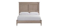 a bed with white sheets and wooden headboard on top of it's frame