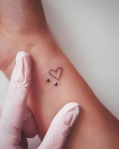 Mini Heart Tattoo Ideas For Wrist Tattoo Ideas Female Hand For Women, Tattoo Ideas Female Hand, Simple Heart Tattoo, Hand Heart Tattoo, Two Hearts Tattoo, Hart Tattoo, Heart Outline Tattoo, Heart Tattoo Ideas, Little Heart Tattoos