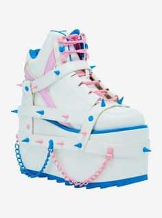 These platform sneakers are perfect for baddies who like to feel cute! They feature strappy buckles and pastel blue and pink spike detailing throughout. Plus  chain accents on the platforms.Listed in women's sizes.Heel: 4" Platform: 3''Polyurethane upper; EVA soleImported Rottmnt Oc, Goth Shoes, White Pastel, Kawaii Shoes, Oc Ideas, Style Aesthetic, Drawing Clothes, Girls Sneakers, Kawaii Clothes