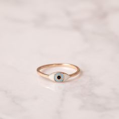 14k Solid Gold Enamel Evil Eye Ring, Dainty Turkish Eye Ring is Great Gift For Her. Stackable Evil Eye Minimalist Gold Ring. The Perfect Protection From Evil Eye Minimalist Gold Ring is agift for mom or new mom gift Material: Real Solid Gold( not plated) Karat: 14 K (585) or 18K (750) Eye Size : 5.00 mm x 11.00 mm Default Color : Rose Gold Default Ring Size : 6.50 US/CA This 14K Plain Gold Evil Eye ring in default color is shipped in the first working day after payment received. According to selected gold color, shipment date may extend 1-2 days.    M o r e  *  F r o m  *  U s   Goldstore Jewelry - https://etsy.me/3gHtcrZ * Editor's Pick - https://etsy.me/3CCLlmm * Evil Eye Necklace - https://etsy.me/3w1EdyD * Evil Eye Bracelet - https://etsy.me/3w5itBU * Evil Eye Ring - https://etsy.me/3M Rose Gold Enamel Ring, Yellow Gold Enamel Rings For Gifts, Enamel Yellow Gold Rings For Gift, Gold Enamel Stackable Rings As Gift, Rose Gold 14k Enamel Ring Fine Jewelry, Fine Jewelry Rose Gold Enamel Ring In 14k Gold, 14k Yellow Gold Enamel Ring Gift, Minimalist Enamel Ring Jewelry, Minimalist Enamel Rings For Gifts