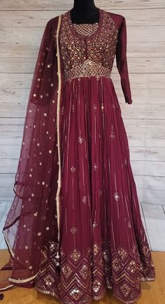 Beautiful Maroon floor length anarkali dress fully embroidered in georgette fabric,comes with matching net dupatta & strechable leggings. Semi-stitched Long Georgette Churidar, Traditional Maxi Dress With Resham Embroidery For Designer Wear, Long Georgette Churidar With Resham Embroidery, Bollywood Style Floor-length Salwar Kameez With Sheer Dupatta, Georgette Churidar With Resham Embroidery, Long Georgette Anarkali Set For Eid, Fitted Long Anarkali Style Sharara, Long Georgette Anarkali Set With Dabka Work, Fitted Full Length Sharara With Resham Embroidery