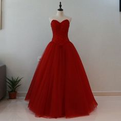 This Dress is fashionable for every occasion. the dress is made-to-order by professional tailors. You can choose from 50 colors, Regular sizes 2 to 16 and plus sizes 14w to 26W. Custom size is also available.. The product details: Color: Burgundy, Silhouette: Ball Gown, Neckline: Strapless, Waistline: Natural Waist, Length: Long, Primary Fabric: Tulle Elegant Sleeveless Quinceanera Evening Dress, Elegant Tulle Quinceanera Dress With Sweetheart Neckline, Elegant Red Tulle Quinceanera Dress, Elegant Quinceanera Dress With Sweetheart Neckline And Tulle Material, Elegant Quinceanera Dress With Sweetheart Neckline And Sweep Train, Elegant Strapless Quinceanera Dress For Prom Season, Elegant Strapless Quinceanera Evening Dress, Fitted Floor-length Quinceanera Evening Dress, Elegant Fitted Quinceanera Evening Dress