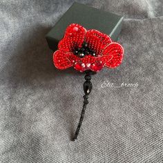 Poppy brooch is a very beautiful and elegant acessory for Remembrance day. Such an original accessory is perfect for your coat, sweater, jacket. The brooch size is 5,5x10 cm (2x3.9 inches). The brooch is embroidered with my hands from quality materials: glass rhinestones (China); Indian thread; Japanese and Czech beads; glass beads; rhinestone chain (China); Italian sequins; genuine leather inside, attached with a Japanese pin. The brooch is beautifully and carefully packed and ready for shipmen Beaded Poppy, Red Poppy Flower, Poppy Brooches, Beaded Charms, Brooch Flower, Rhinestone Chain, Red Poppy, Remembrance Day, Embroidery Tutorials