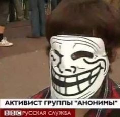 a man with a face painted to look like a guy wearing a mask on the street