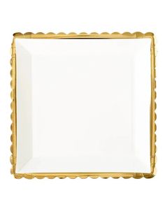 a square white and gold plate with scalloped edges