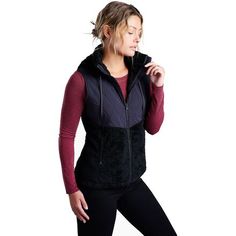 When the temps are chilly, we zip up the Prima Flight Vest from KUHL for premium warmth and soft, active comfort. This top-tier vest blends midweight Italian fleece with nylon taffeta overlays at the chest and shoulders to boost water-resistance and durability where we need it most. Plus, we appreciate the plush collar and removable hood offering us versatility to adapt with changing conditions. Fleece Vest, Fleece Fabric, Womens Vest, Stylish Women, Flight, Zip Ups, Jackets & Coats, Jackets For Women, Clothes For Women