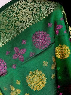 PLEASE NOTE - Width of dupatta is 32 inches and length is 92 inches. Gorgeous Green Color Banarasi Dupatta in Soft Silk Meenakari Chakras and black color tassles on the ends of the dupatta. Makes a Perfect Gift! Item: DupattaColor : GreenFabric : Banarasi Silk (Non-Pure Silk)Work : Meenakari Work with tassels Length of the dupatta : 32 inches (approx)Width of the dupatta : 92 inches (approx) Store Policies- No return or exchange will be accepted for color variations.- No return or exchange will Benarasi Dupatta, Men's Ethnic Wear, Bandhani Saree, Readymade Blouse, Kantha Stitch, Silk Dupatta, Cotton Silk, Pure Silk, Gift Item