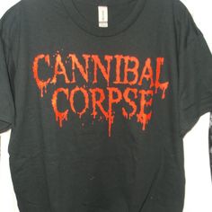 New/Unworn - Cannibal Corpse 2022 North American Tour T-Shirt. Standard Unisex Crew Neck, Short Sleeve T-Shirt With Graphic Print Front And Back. Gildan Heavy Cotton 100% Cotton. Alternative Style T-shirt For Fall Concert, Black Band Logo Merch Shirt, Black Deadstock T-shirt For Halloween, Black Horror Graphic Print Shirt, Black Band Logo T-shirt For Fall, Black Band Logo Shirt, Black Cotton Shirt With Band Logo, Black Band Merch Shirt For Fall, Alternative Style Black Shirt For Fan Merchandise