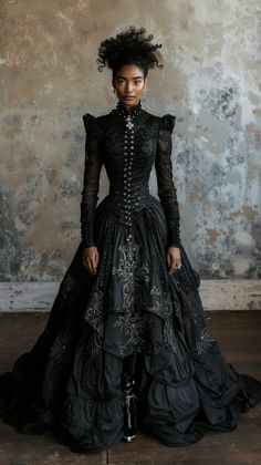 Embrace the drama and beauty of Gothic Victorian fashion with this exquisite black gown. The intricate detailing and high-neck design reflect the opulence of the 19th century, while the modern styling and bold silhouette create a powerful, timeless look. Perfect for those who appreciate the art of fashion storytelling. #GothicFashion #VictorianElegance #TimelessBeauty #DarkRomance Victorian Queen Costume, Women Gothic Fashion, 18th Century Gothic Fashion, Victorian Inspo Outfit, Victorian High Fashion, The Victorian Era Aesthetic, Gothic Victorian Wedding Dress, Gothic Gown Victorian Era, Victorian Female Fashion