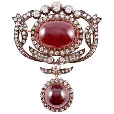 Purchased from famed Macklowe Gallery in 2009 for $15,000, this timeless treasure is as lovely now as it was then! In sterling silver over 14 karat yellow gold, with cabochon-cut garnets and a stated weight of 4.50 cts in diamonds, it can be worn as a brooch or as a lovely hair ornament! The lower drop portion can also be removed. Diamond Flower Brooch, Art Deco Brooch, Antique Silver Jewelry, Diamond Bows, Antique Brooches, Garnet Jewelry, Diamond Brooch, Royal Jewels, Antique Diamond