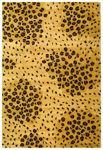 an animal print area rug with brown spots on the top and black spots on the bottom