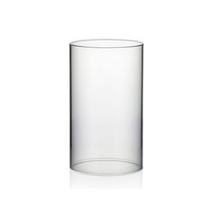 a tall glass vase sitting on top of a white table