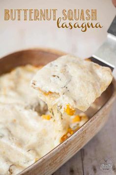 a spoon scooping some food out of a casserole dish with the words butternut squash lasagna on it