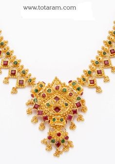 22 Karat Gold Ruby Necklace & Long Earrings set with intricate workmanship. 
  Gross Gold Weight: 41.950 grams
  Ruby & Emerald Weight: 13.50 Carats
  Length of Necklace : 9.50 inches 
  Length of pendant : 1.70 inches 
  Width of Pendant : 1.25 inches 
  Length of Earring : 1.00 inches
  Width of Earring : 0.40 inches
   - 235-GS1168 - in 41.950 Grams for USD $3496.99. 
Made in India by Totaram Jewelers Online this product is in Gold - 22 Karat BIS Hallmark 916 KDM Gold  & is an Ruby Emerald Necklace, Gold Ruby Necklace, 22k Gold Bangles, Gold Bangles For Women, Ruby Emerald, Bridal Gold Jewellery Designs, Ruby Necklace, Gold Diamond Jewelry, Emerald Necklace