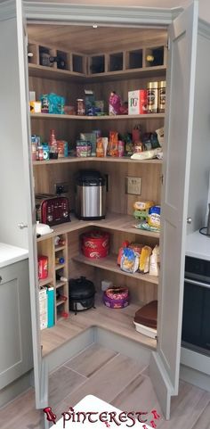 an open pantry with lots of food in it