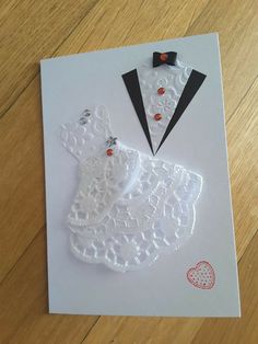 a card with a suit and tie on it