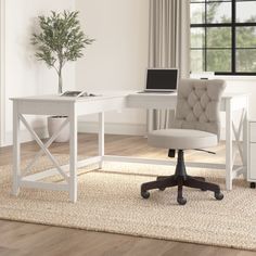 a white desk with a laptop computer on it and a chair in front of it