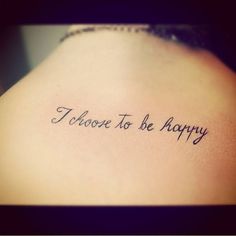 a woman's back with the words i choose to be happy written on it