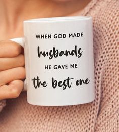 a woman holding a coffee mug with the words, when god made husbands he gave me the best one