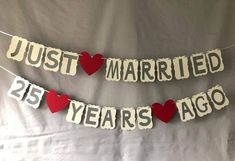 just married and 25 years ago banner with hearts