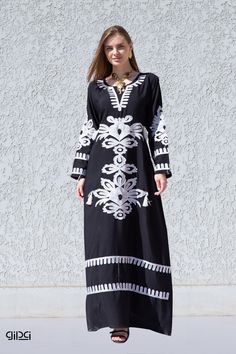 This Kaftan maxi dress is ideal to wear for any casual occasion. Whether a wedding, gathering, taking a trip down the shopping lane, or home-based kitty parties, or about anything else, wearing this dress will make you feel classy and comfortable.  The perfect house dress for lounging or having a coffee in your backyard on a beautiful morning, all while looking beautiful and feeling comfortable at the same time. Made of breezy and light fabric, it will make you feel relaxed.  Fabric : 80% Egypti Bohemian Black Kaftan For Eid, Black Bohemian Kaftan For Eid, Traditional Long Sleeve Abaya For Vacation, Black Kaftan For Beach And Eid, Bohemian Maxi Length Abaya For Eid, Free Size Maxi Dress For Eid, Black Beach Dress For Eid, Traditional Black Free Size Dress, Eid Vacation Abaya In Maxi Length