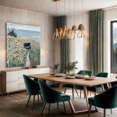 a dining room with green chairs and a painting hanging on the wall above it's wooden table