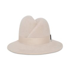 A reinvented staple that is the namesake of Gigi’s great-grandmother. This fedora is bold yet subtle. The signature front scar fedora crown is hand blocked using velour felt and trimmed with sleek cotton sateen ribbon. An individual and distinct style that has been seen on celebrities including Rita Ora and Jodie-Turner Smith. 100% Velour Felt Cotton Sateen Ribbon Detail Embellished with Metallic Hardware Handmade in New York City Gigi Burris Millinery was founded to preserve the romantic craft Jodie Turner, Short Brim Hat, Womens Fedora, Rita Ora, Fedora, Hats For Women, Timeless Design, York City, New York City