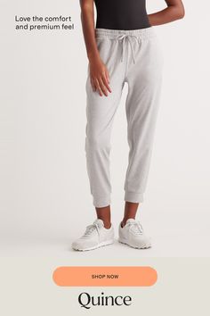 Our favorite performance joggers are a slim fit with the perfect amount of stretch for ultimate comfort. Thick drawstrings, cuffed ankles, and two pocket design give them a premium feel. Our Flowknit fabric is made from Global Recycle Standard poly yarn, which diverts and recycles plastics destined for landfill or the ocean, so you can feel and look good in what you wear.  | Quince | Women's Flowknit Mid-Rise Jogger in Heather Pale Grey, Size XL, Recycled Polyester Athleisure Joggers With Functional Drawstring For Jogging, Sporty Joggers With Elastic Cuffs For Leisure, Sportswear Joggers With Elastic Cuffs For Leisure, Leisure Sportswear Joggers With Elastic Cuffs, Stretch Athleisure Joggers With Drawstring, Relaxed Fit Joggers With Elastic Cuffs For Jogging, Athleisure Joggers With Elastic Cuffs For Leisure, Relaxed Fit Activewear With Drawstring For Jogging, Leisure Joggers With Ribbed Waistband In Athleisure Style