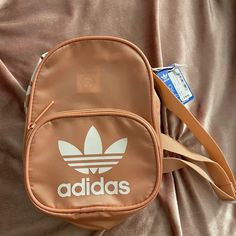 Brand New Adidas Backpack (Pink/Peach With White Logo) The Bag Is New With Tags Pink Crossbody Backpack For Daily Use, Pink Sporty Standard Backpack, Casual Pink Crossbody Backpack, Adidas Pink Bags For Everyday Use, Pink Adidas Backpack For Daily Use, Adidas Pink Backpack For Daily Use, Pink Adidas Travel Backpack, Adidas Back To School Rectangular Bag, Trendy White Adidas Bag